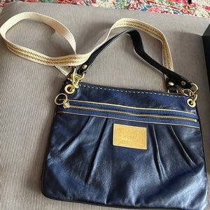Coach bag with tag.